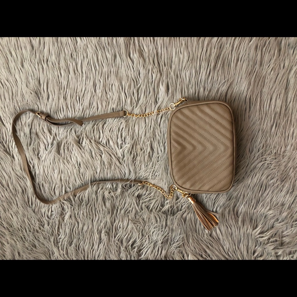 Tan cross body bag